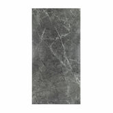 Atlanta Black porcelain slab flat view showing deep charcoal grey marble surface with bold white veining and natural marble movement for UAE interior design