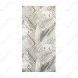 Sage Fog Matte porcelain slab displayed on easel against luxury backdrop showing soft botanical leaf print in muted sage and grey tones for UAE interior design