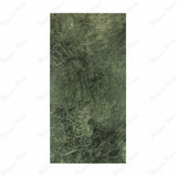 Bidasar Excel porcelain slab flat view showing deep emerald green marble surface with intricate white and pale green veining