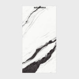 Large format white porcelain slab with dramatic black veining for luxury UAE interiors