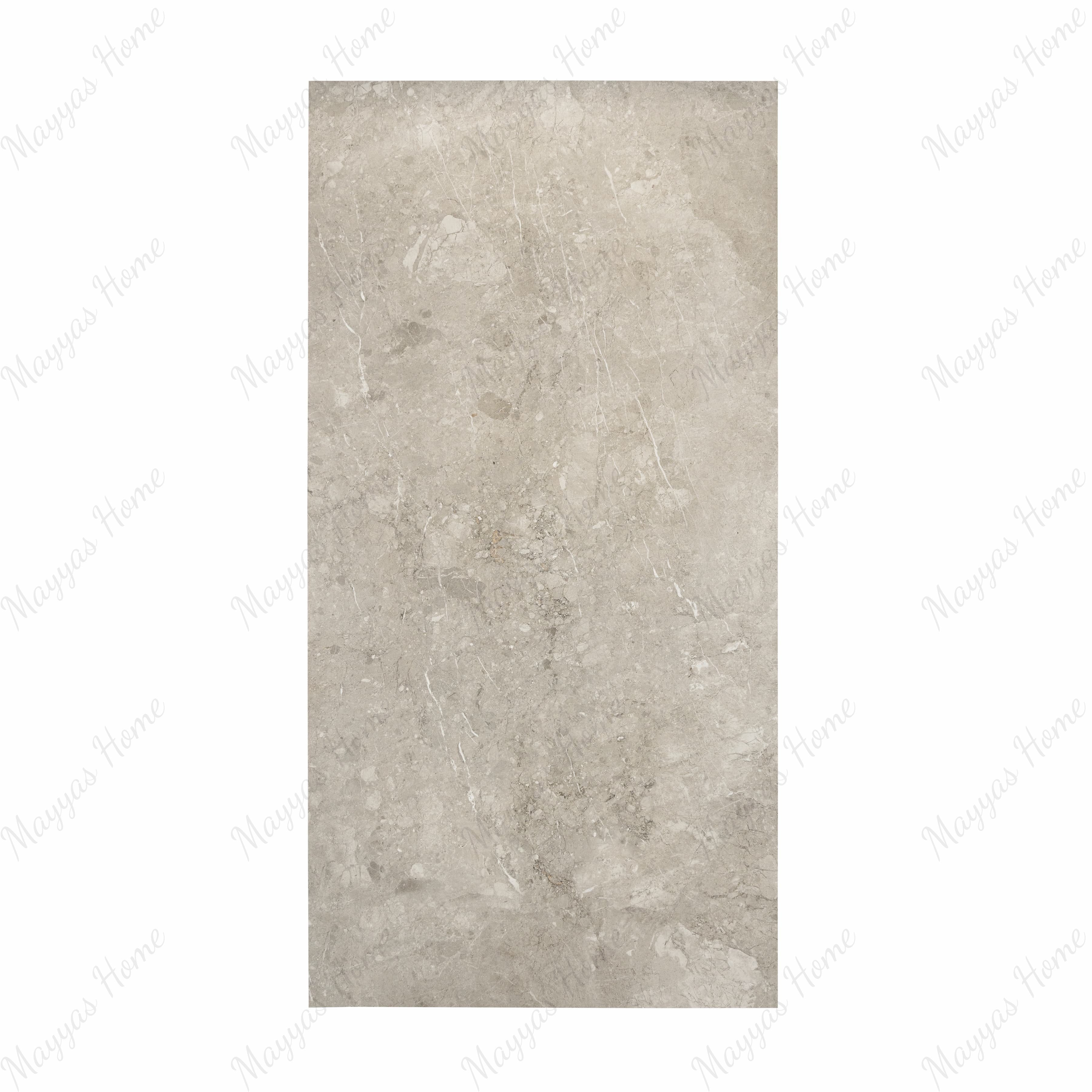 Element Coach Smoke porcelain slab displayed on easel against luxury backdrop showing smoky grey natural stone surface with terrazzo-like texture for UAE interior design