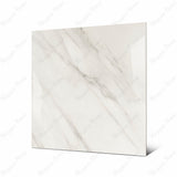 Calcutta Aurora large format porcelain tile angled view highlighting polished Calacatta marble finish, diagonal veining, and rectified edges