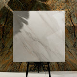 Calcutta Aurora 120x120cm glossy porcelain tile flat view showing bright white Calacatta marble surface with flowing grey veining