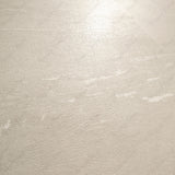 Element Cotano Dust large format porcelain slab angled view highlighting matte stone finish, soft cloudy movement, and rectified edges