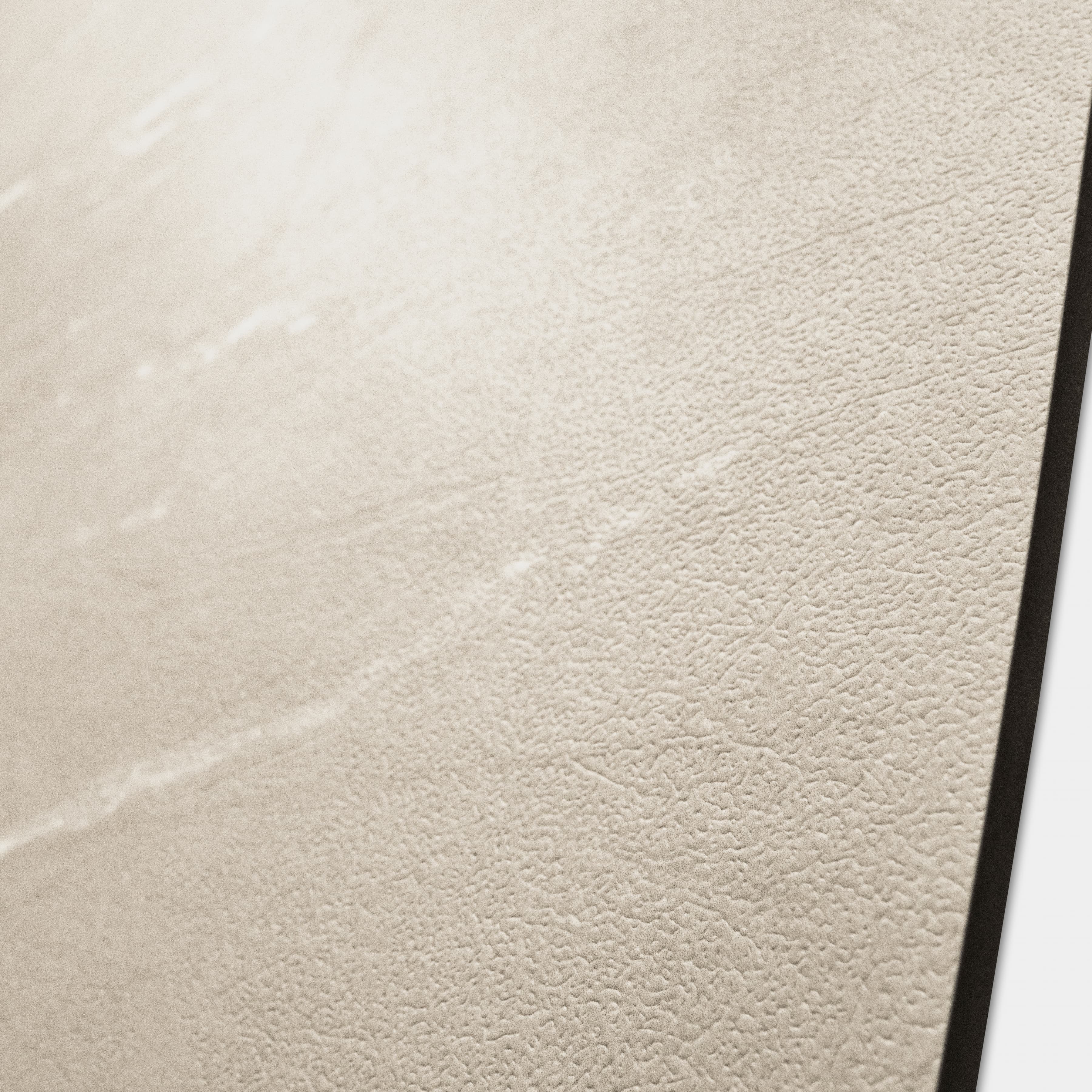 Close-up of Element Cotano Dust porcelain slab showing refined ivory surface with fine wispy veining and warm sand undertones