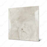 Marbella Gold large format porcelain tile angled view highlighting polished onyx finish, natural crystalline patterns, and rectified edges