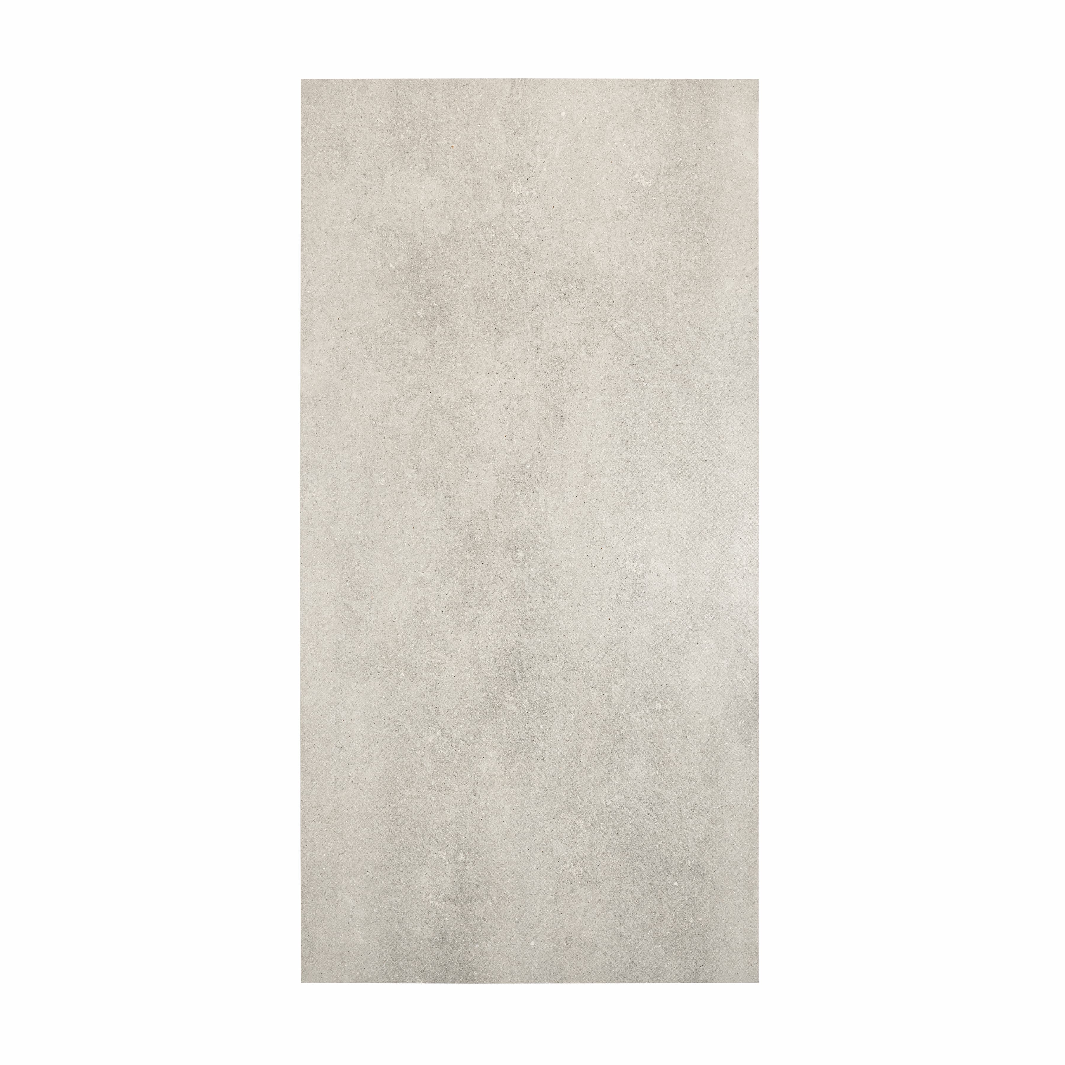 Element Arsenica Grey porcelain slab displayed on easel against luxury backdrop showing minimalist grey concrete-look surface for UAE interior design