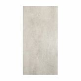Element Arsenica Grey porcelain slab displayed on easel against luxury backdrop showing minimalist grey concrete-look surface for UAE interior design