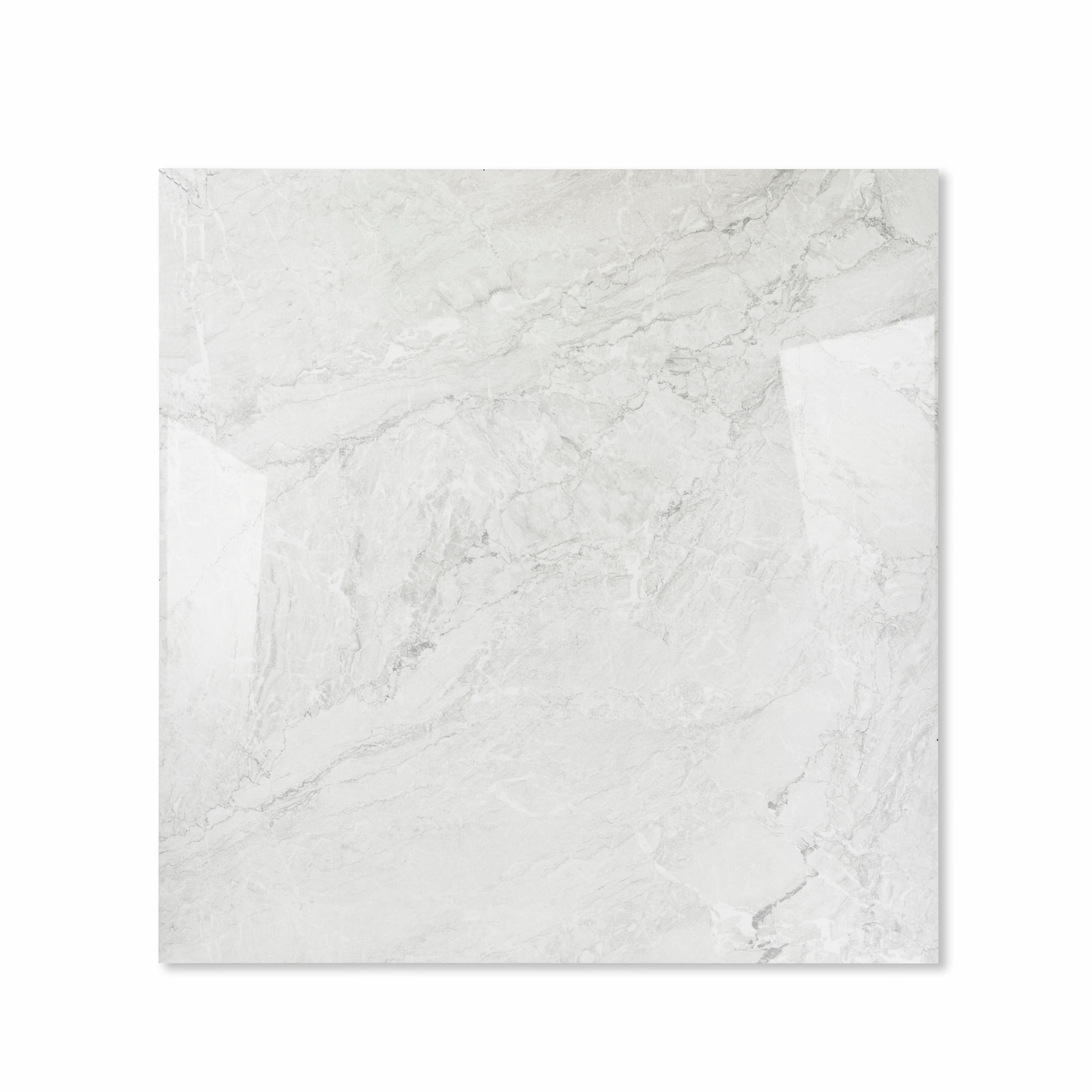 Silver Fume glossy porcelain tile 120x120cm displayed on easel against luxury marble backdrop for UAE interior design