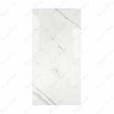 Statuario Platina BM porcelain slab displayed on easel against luxury backdrop showing crisp white marble surface with elegant grey veining for UAE interior design