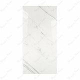 Statuario Platina BM porcelain slab displayed on easel against luxury backdrop showing crisp white marble surface with elegant grey veining for UAE interior design