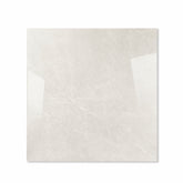 Pietra Bianco glossy porcelain tile 120x120cm displayed on easel against luxury marble backdrop for UAE interior design