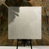 Pietra Bianco 120x120cm glossy porcelain tile flat view showing soft ivory stone-look surface with delicate white veining