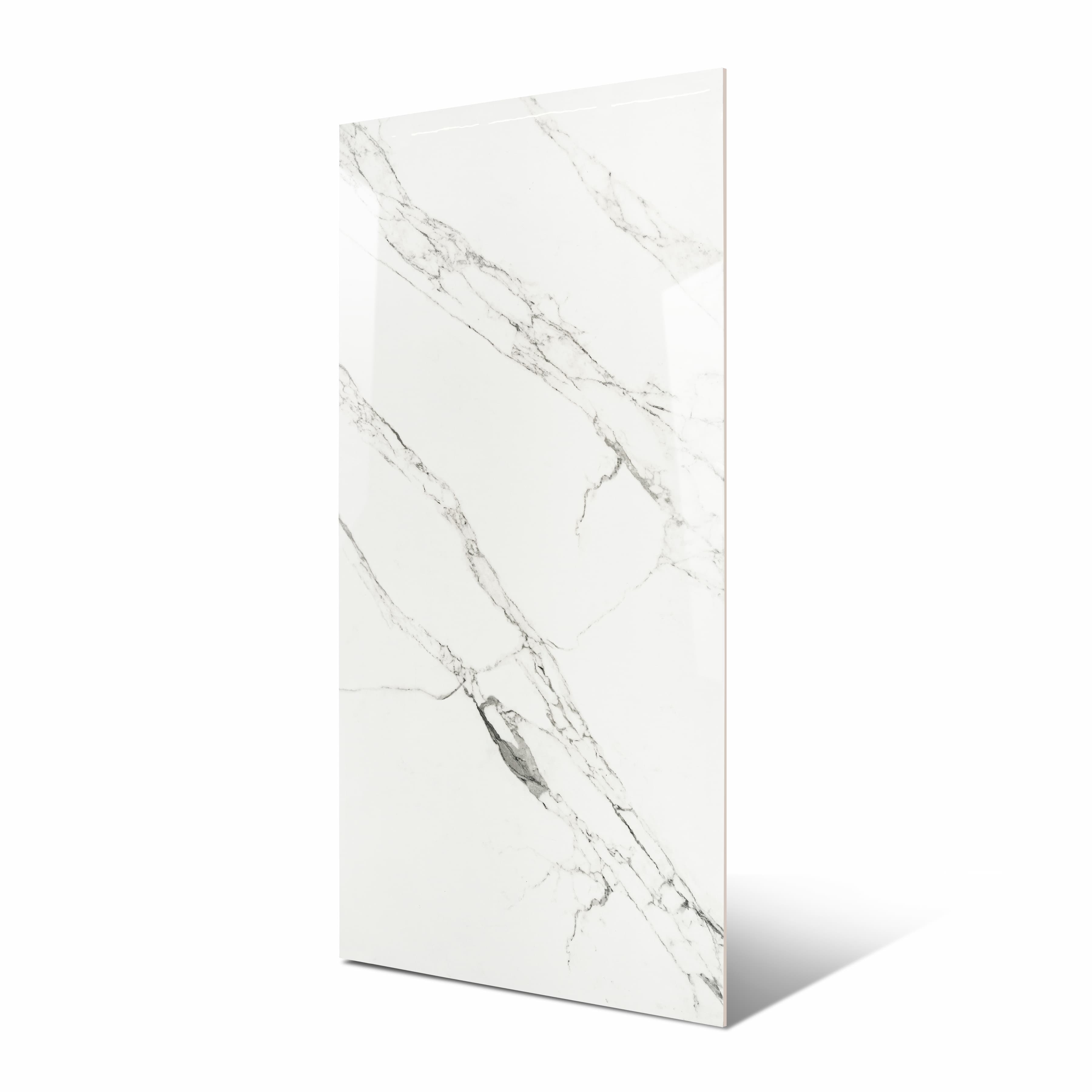 Garfagnana BM porcelain slab flat view showing bright white Calacatta-look surface with intricate branching grey veining and natural marble movement