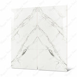 Close-up of Garfagnana BM porcelain slab showing mirror-polished white surface with detailed fine grey vein network and subtle charcoal mineral accents