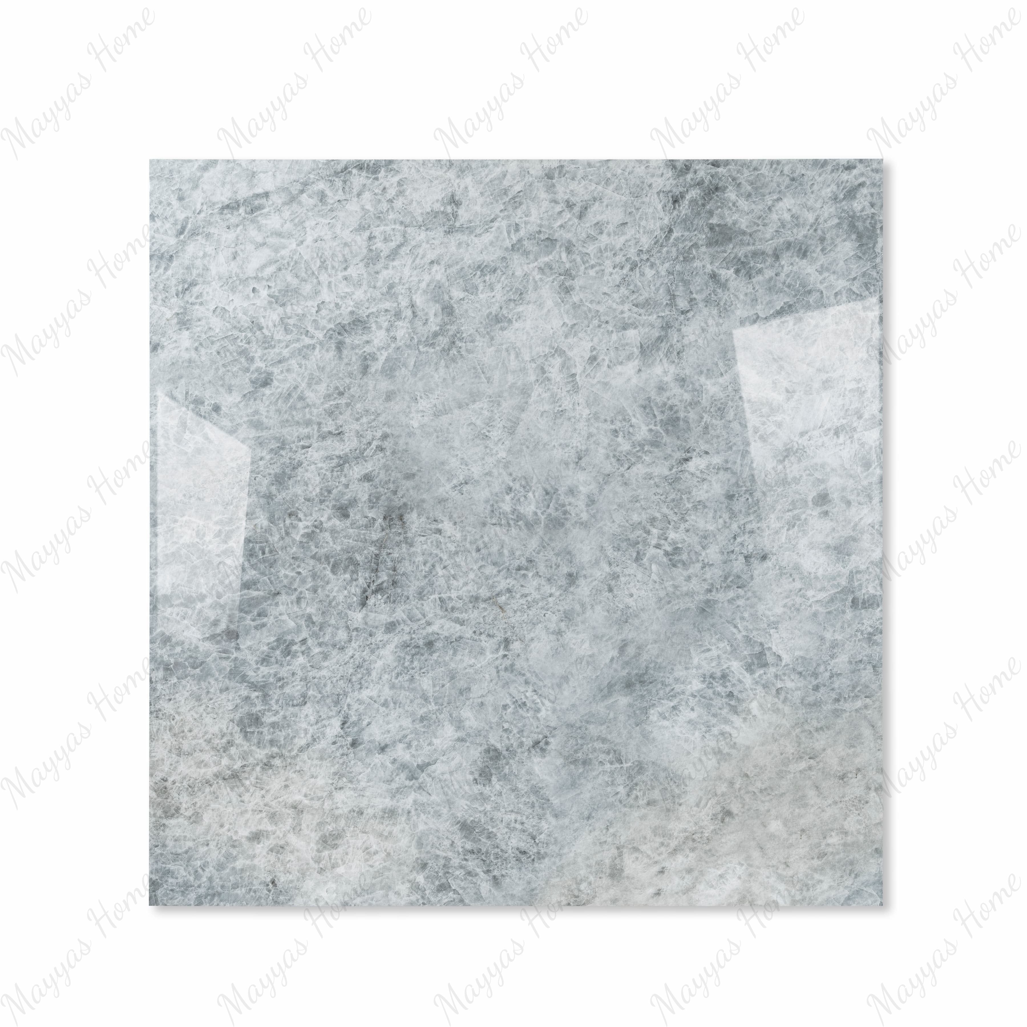 Celest Onyx glossy porcelain tile 120x120cm displayed on easel against luxury marble backdrop for UAE interior design