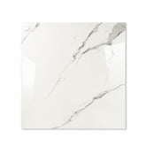 Statuario Hexa glossy porcelain tile 120x120cm displayed on easel against luxury marble backdrop for UAE interior design