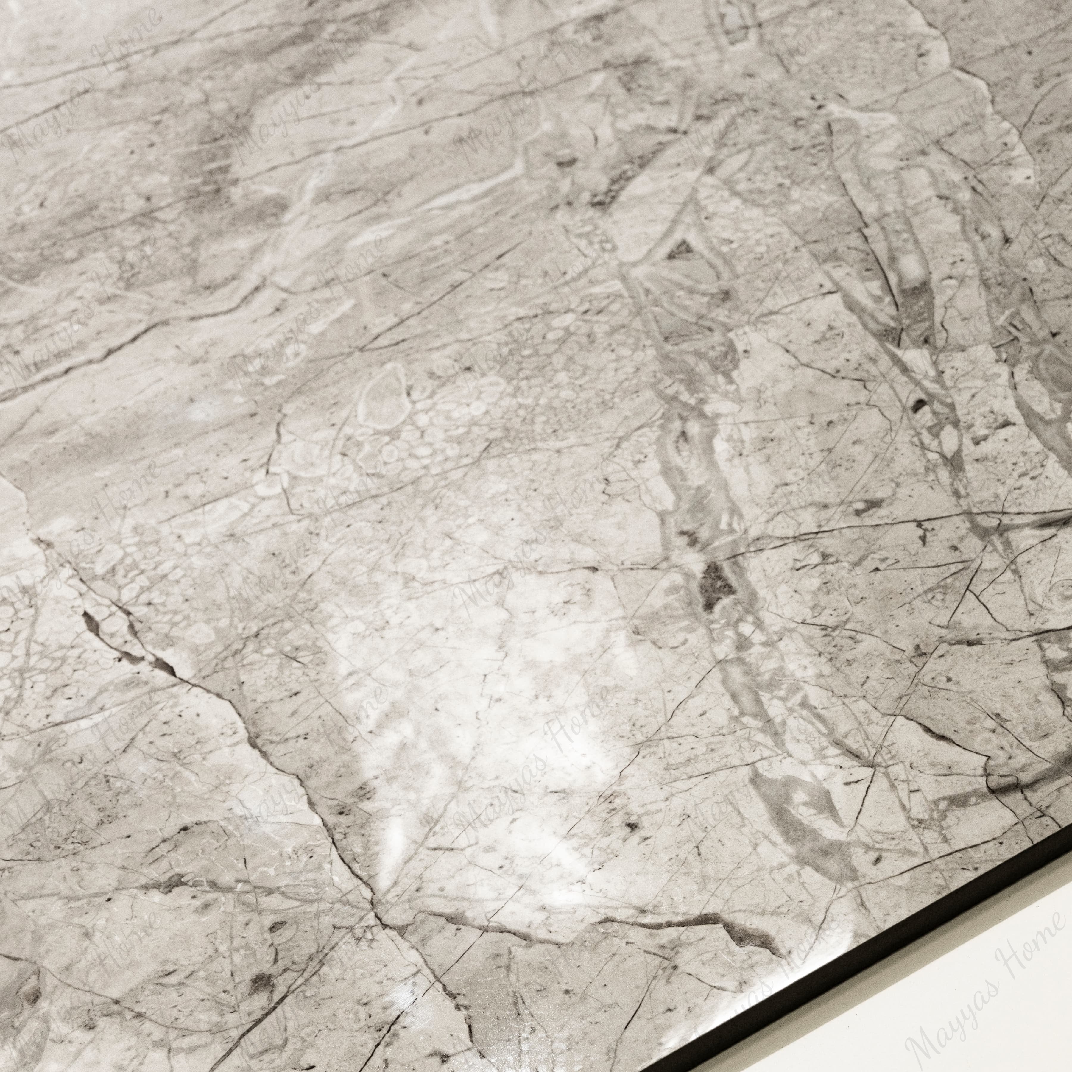 Close-up of Breccia Bianco glossy porcelain tile showing mirror-polished marble surface with detailed dark vein clusters and 9mm thickness.