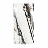Calacatta Oyster BM porcelain slab displayed on easel against luxury backdrop showing white marble with dramatic black and copper veining for UAE interior design