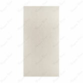 Berline Beige large format porcelain slab angled view highlighting matte concrete-look finish, fine terrazzo speckle, and rectified edges
