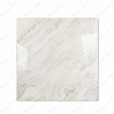 Antaliya White glossy porcelain tile 120x120cm displayed on easel against luxury marble backdrop for UAE interior design