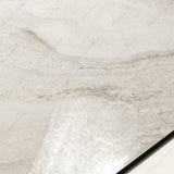 Close-up of Antaliya White glossy porcelain tile showing mirror-polished marble surface with detailed veining and 9mm thickness