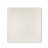 Oslo Pearl matte porcelain tile 120x120cm displayed on easel against luxury marble backdrop for UAE interior design