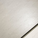 Close-up of Oslo Pearl matte porcelain tile showing fine natural stone texture, pearl-ivory tone, and 9mm thickness