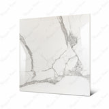 Alps Natural large format porcelain tile angled view highlighting polished statuario marble finish, bold veining, and rectified edges