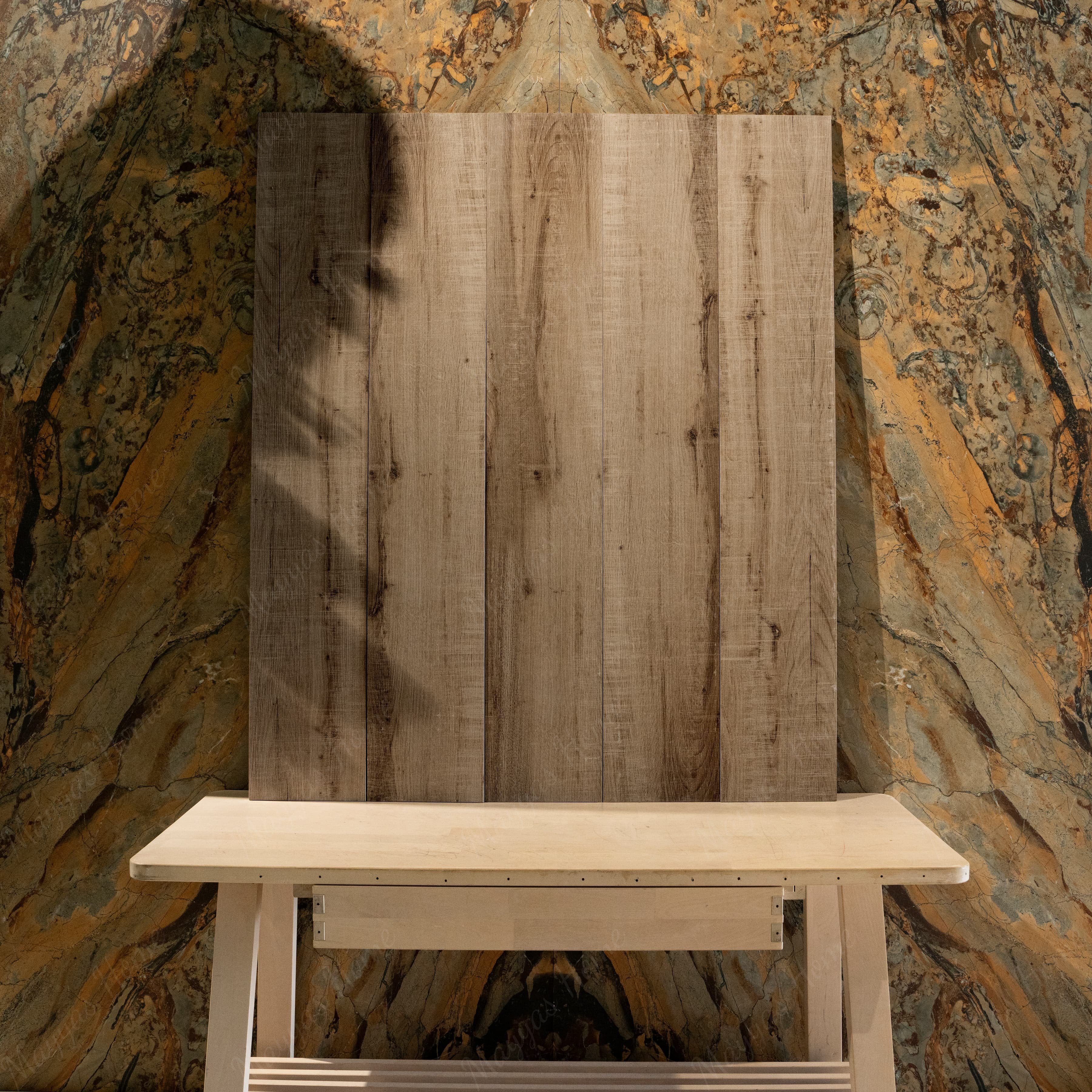 Close-up of Arizon Crema wood-look porcelain plank showing detailed saw-cut grain, natural knot detail, and warm caramel tonal accents