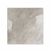 Burberry Grey glossy porcelain tile 120x120cm displayed on easel against luxury marble backdrop for UAE interior design