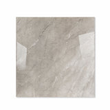 Burberry Grey glossy porcelain tile 120x120cm displayed on easel against luxury marble backdrop for UAE interior design