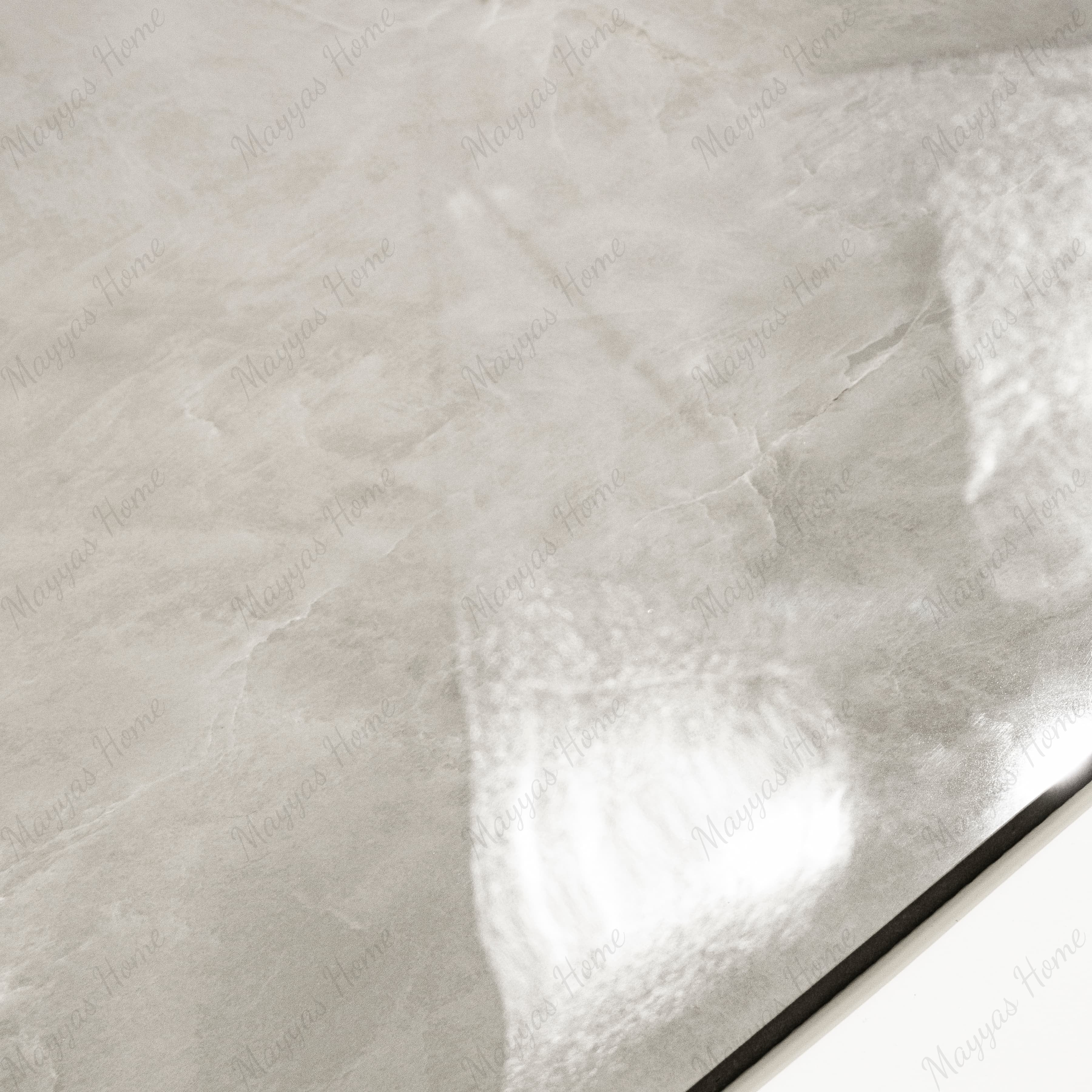 Close-up of Royal Beige glossy porcelain tile showing mirror-polished marble surface with delicate white vein detail and 9mm thickness