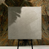 Royal Beige 120x120cm glossy porcelain tile flat view showing soft beige marble surface with cloudy tonal movement