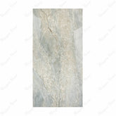 Aurora Aqua Onyx porcelain slab displayed on easel against luxury backdrop showing soft aqua quartzite with beige veining for UAE interior design
