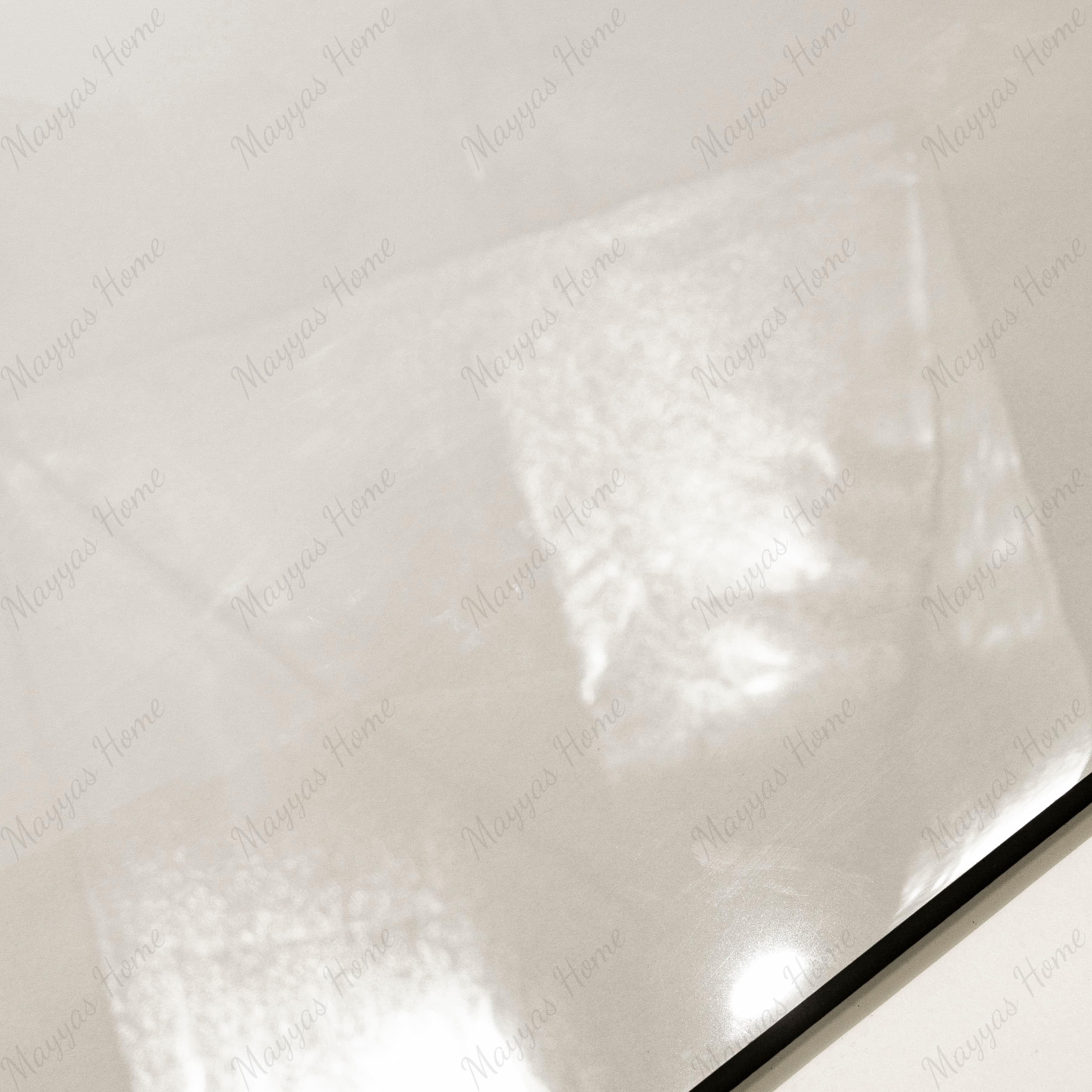 Close-up of Onyx Helio glossy porcelain tile showing mirror-polished translucent ivory surface, delicate cloud-like veining, and 9mm thickness