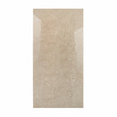 Cityscape Griege Endless porcelain slab displayed on easel against luxury backdrop showing warm greige marble with delicate white veining for UAE interior design