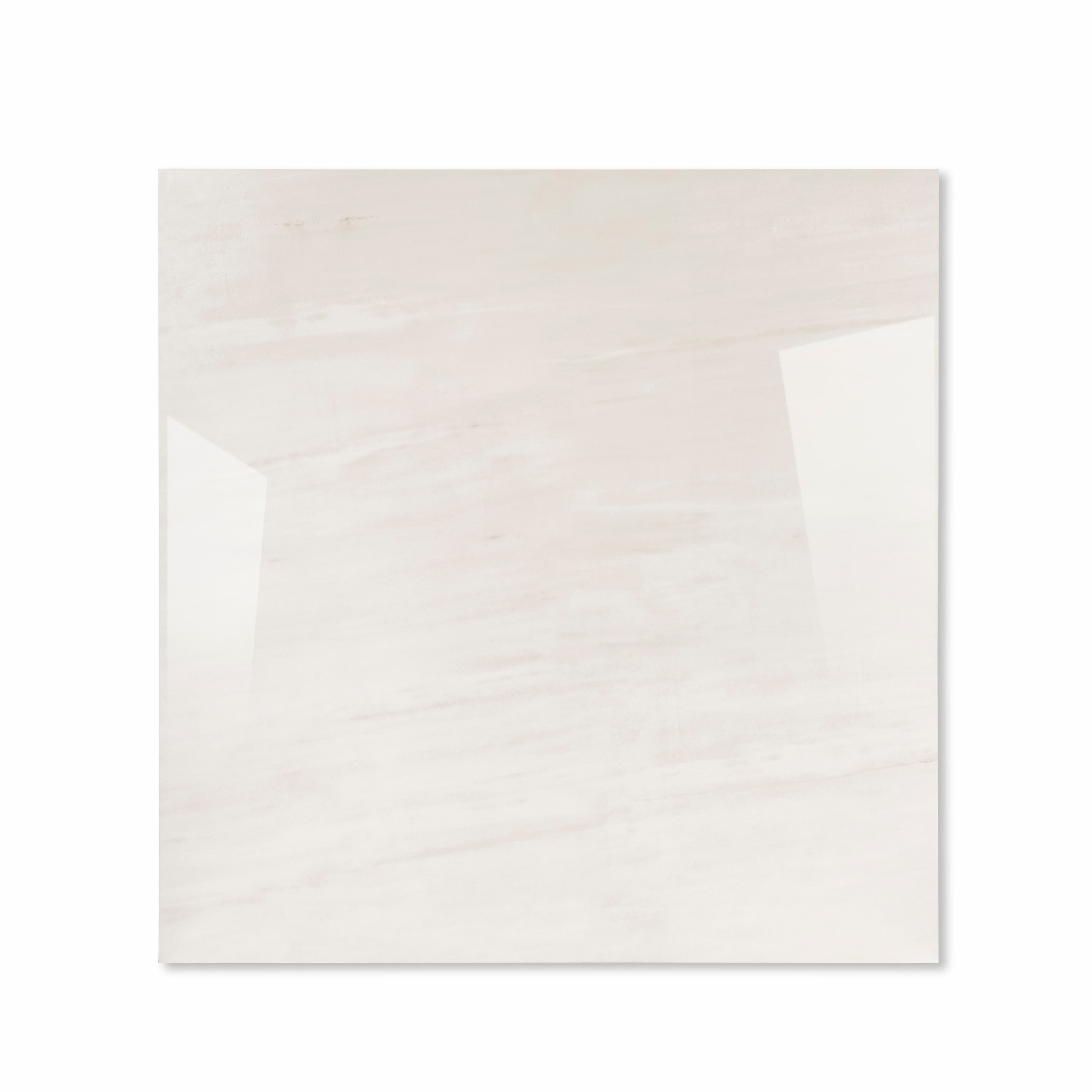 Melton Bianco glossy porcelain tile 120x120cm displayed on easel against luxury marble backdrop for UAE interior design