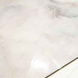 Aurora Pearl glossy marble porcelain tile 60x120cm with 9mm thickness features soft pearl tones, subtle veining and polished finish.