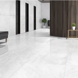 BURBERRY BIANCO – 120x120cm glossy porcelain tile with a soft white marble look. Premium large format surface for sophisticated modern interiors.