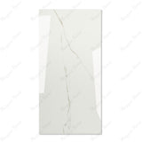 Calacatta Bianco glossy marble effect porcelain tile 60x120cm with 9mm thickness features bold veining and a refined polished finish for luxury spaces.