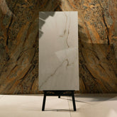 Calcutta Bianco Oro glossy marble porcelain tile 60x120cm with 9mm thickness features white base, gold and grey veining with polished finish.