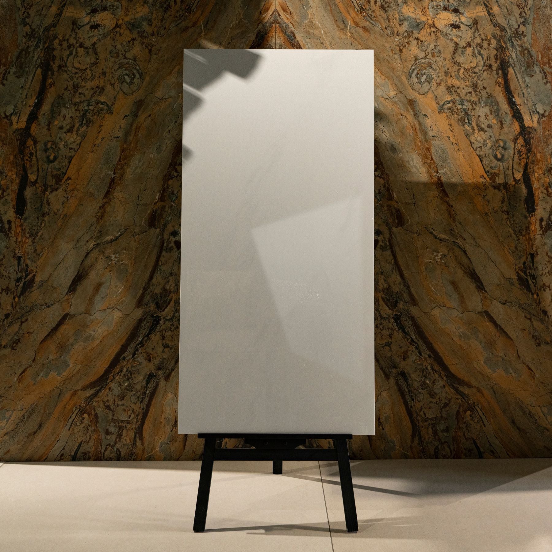 Carara Grey glossy marble effect porcelain tile 60x120cm with 9mm thickness features soft grey tones, subtle veining and polished finish.