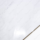 Celeste White glossy marble effect porcelain tile 60x120cm with 9mm thickness features bright white base, soft grey veins and polished finish.