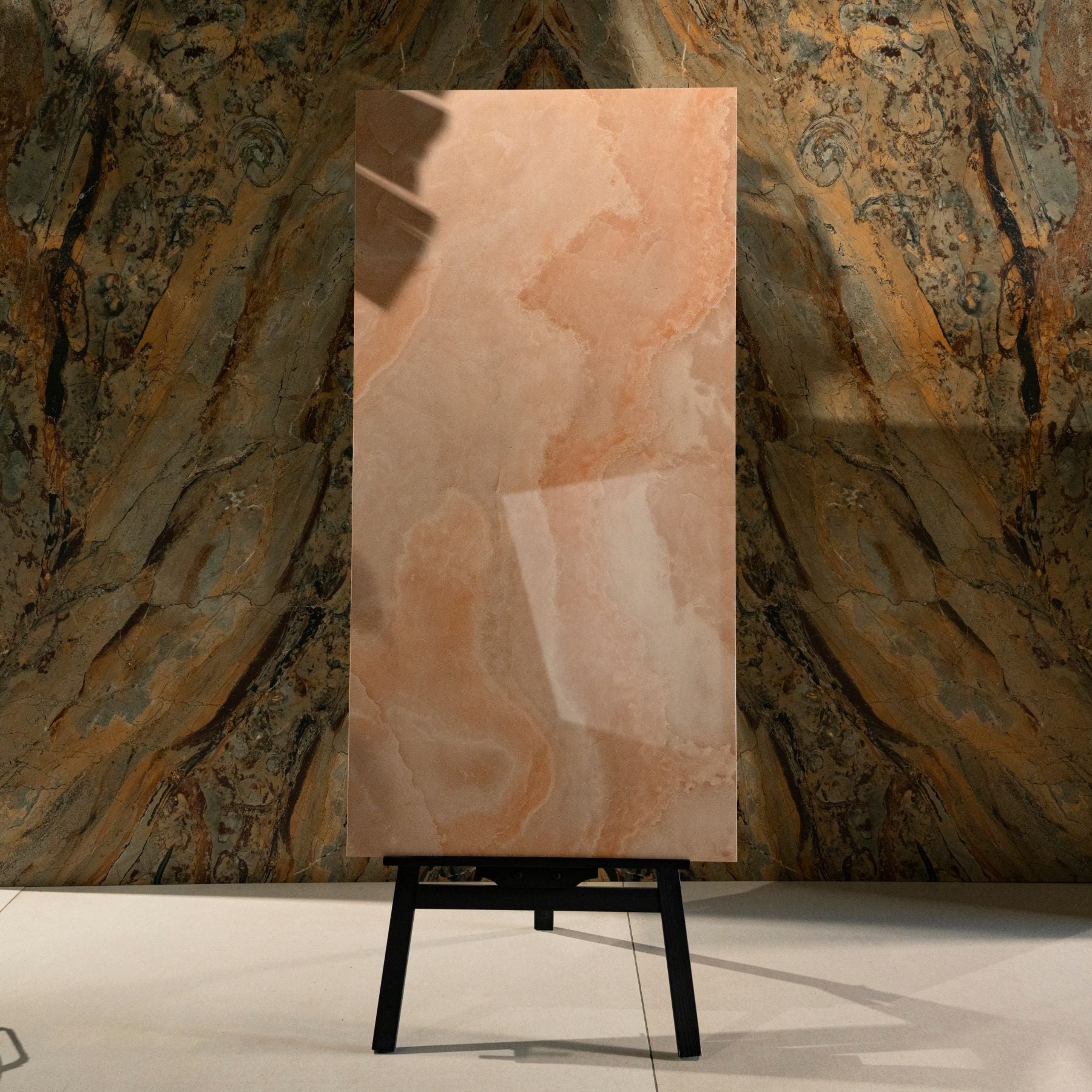 Coral Onyx glossy onyx effect porcelain tile 60x120cm with 9mm thickness features warm coral tones and polished luxury finish.