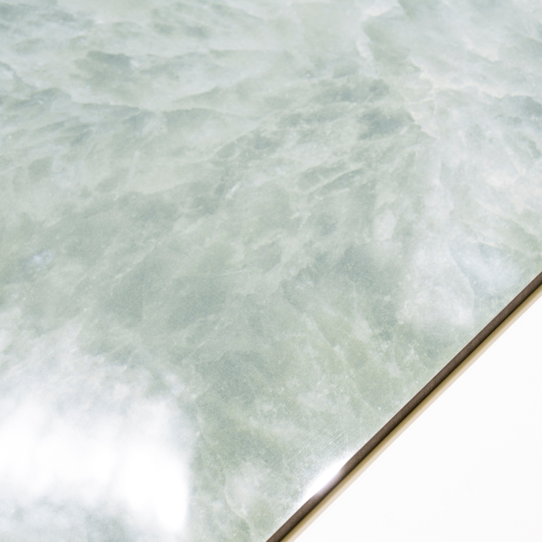 Emerald Fur porcelain tile 60x120cm 9mm thickness, green marble look design, durable porcelain, ideal for modern floors and walls.