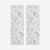 Enhance your space with stone look tiles in grey, featuring intricate carving details and a refined matt finish. Ideal for large format tiles.