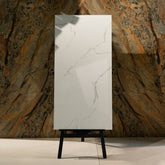 Eterna White glossy marble effect porcelain tile 60x120cm with 9mm thickness features bright white base, soft grey veins and polished finish.