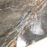 Lava Brown glossy porcelain tile 60x120cm with 9mm thickness features rich brown tones, natural stone texture and elegant polished finish.