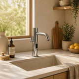 Luxury mains-powered electronic basin mixer tap with extended body, modern above-counter installation and water-saving flow control.